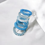 Élastiques en spirales bleus pour cheveux bouclés et frisés