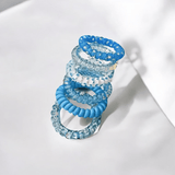 Élastiques en spirales bleus pour cheveux bouclés et frisés