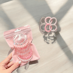 Élastiques en spirales roses pour cheveux bouclés, sans trace