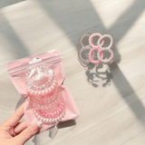 Élastiques en spirales roses pour cheveux bouclés, sans trace