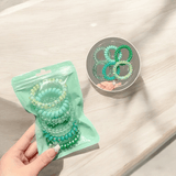 Élastiques en spirales beiges pour cheveux bouclés, sans trace