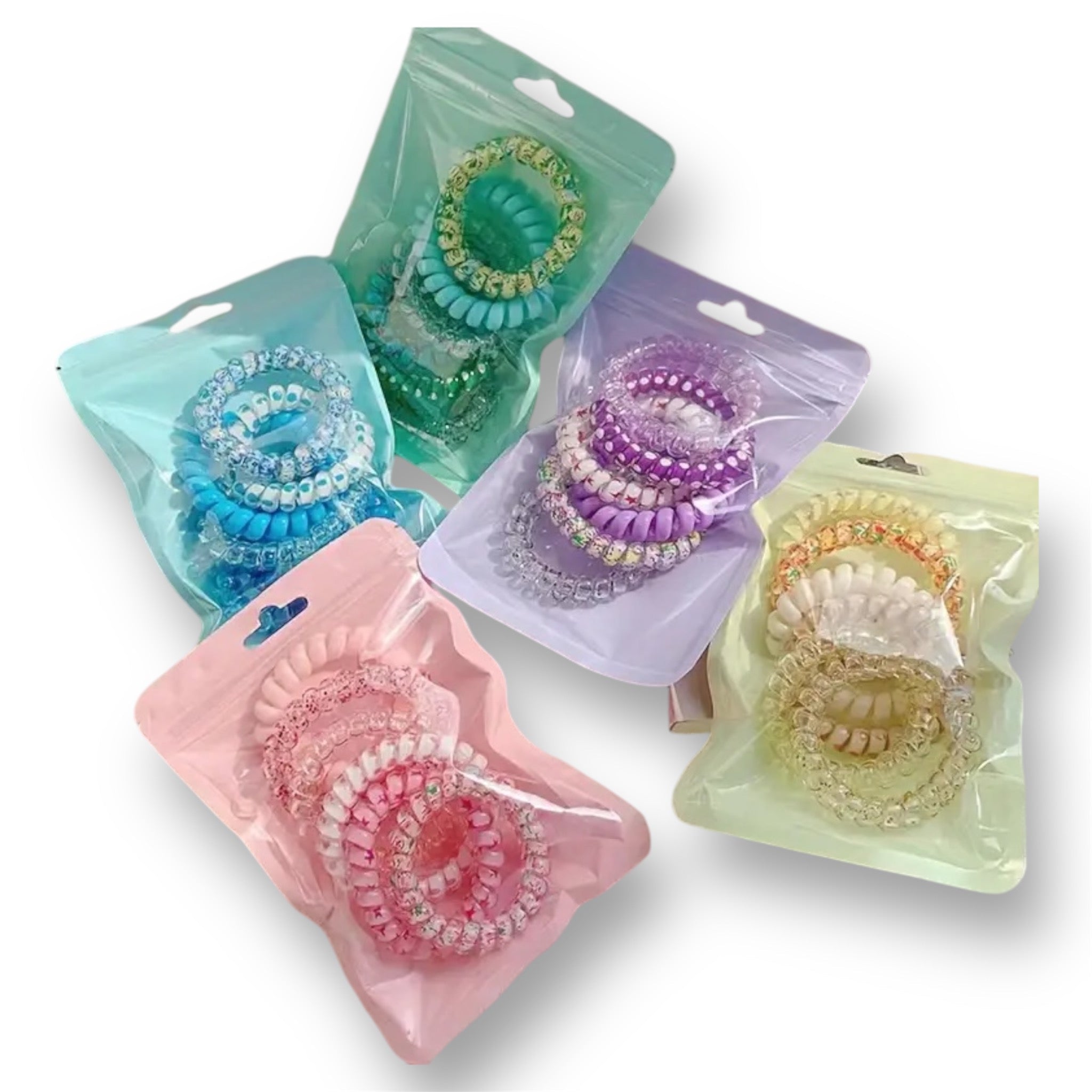Élastiques en spirales – soin cheveux bouclés | L’Art des Boucles Suisse