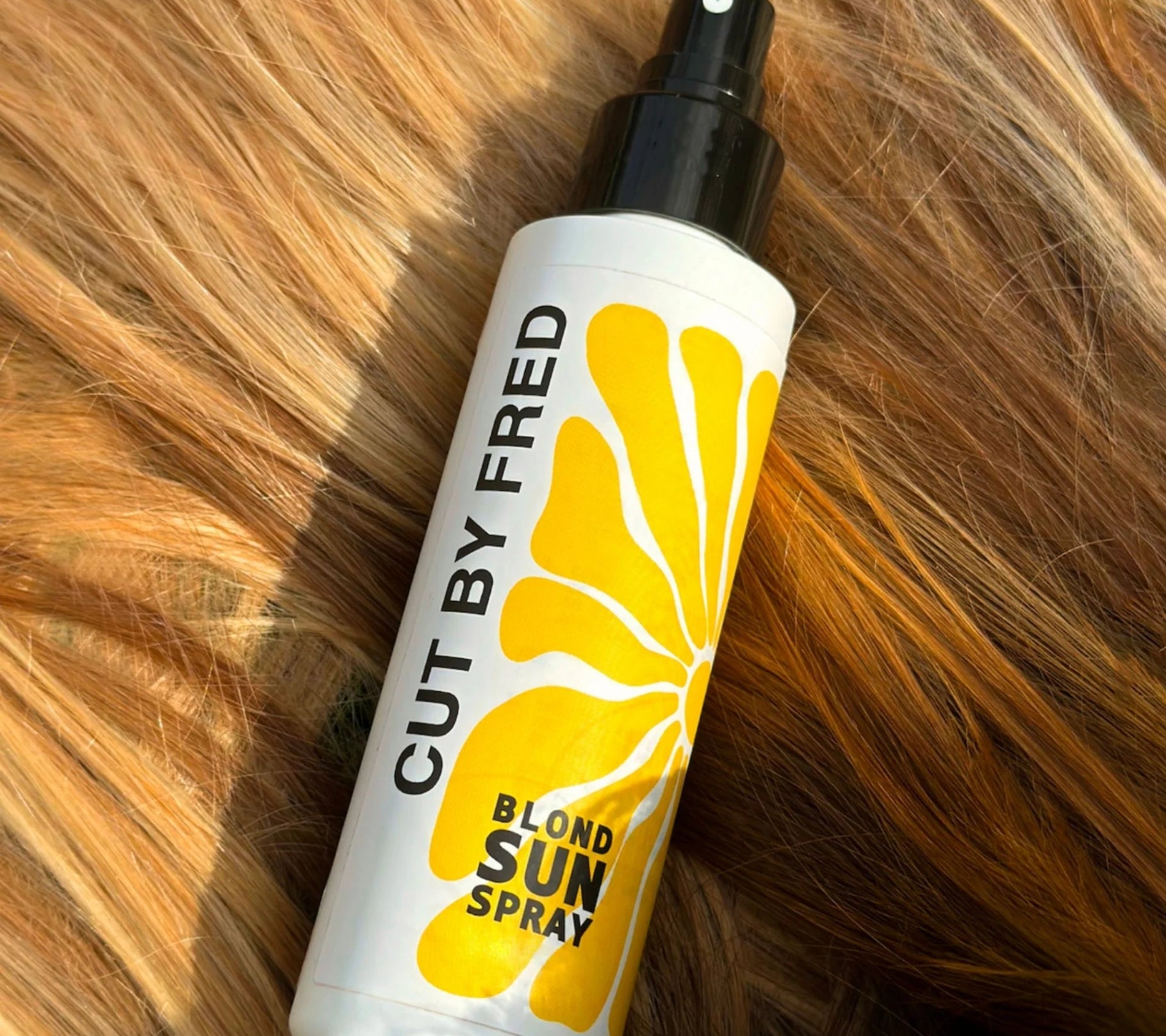 Spray Éclaircissant Blond Sun – Reflets Soleil Naturels | Cut By Fred – soin capillaire naturel pour cheveux ondulés, bouclés, frisés et crépus | L’Art des Boucles Suisse